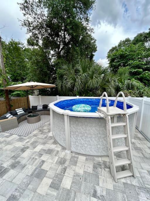 Holiday home 4 Bedroom 3 Full Bath Boho Oasis Saltwater Pool Near Downtown, North Of Hyde Park Sleeps 12 Pets Ok