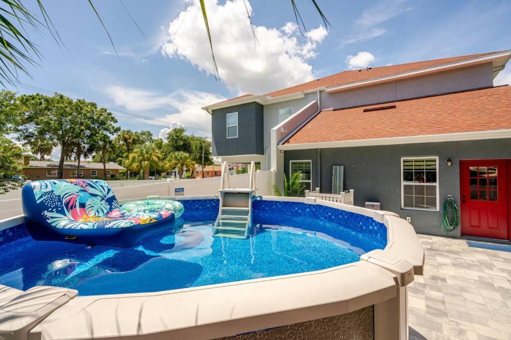 Holiday home 4 Bedroom 3 Full Bath Boho Oasis Saltwater Pool Near Downtown, North Of Hyde Park Sleeps 12 Pets Ok *